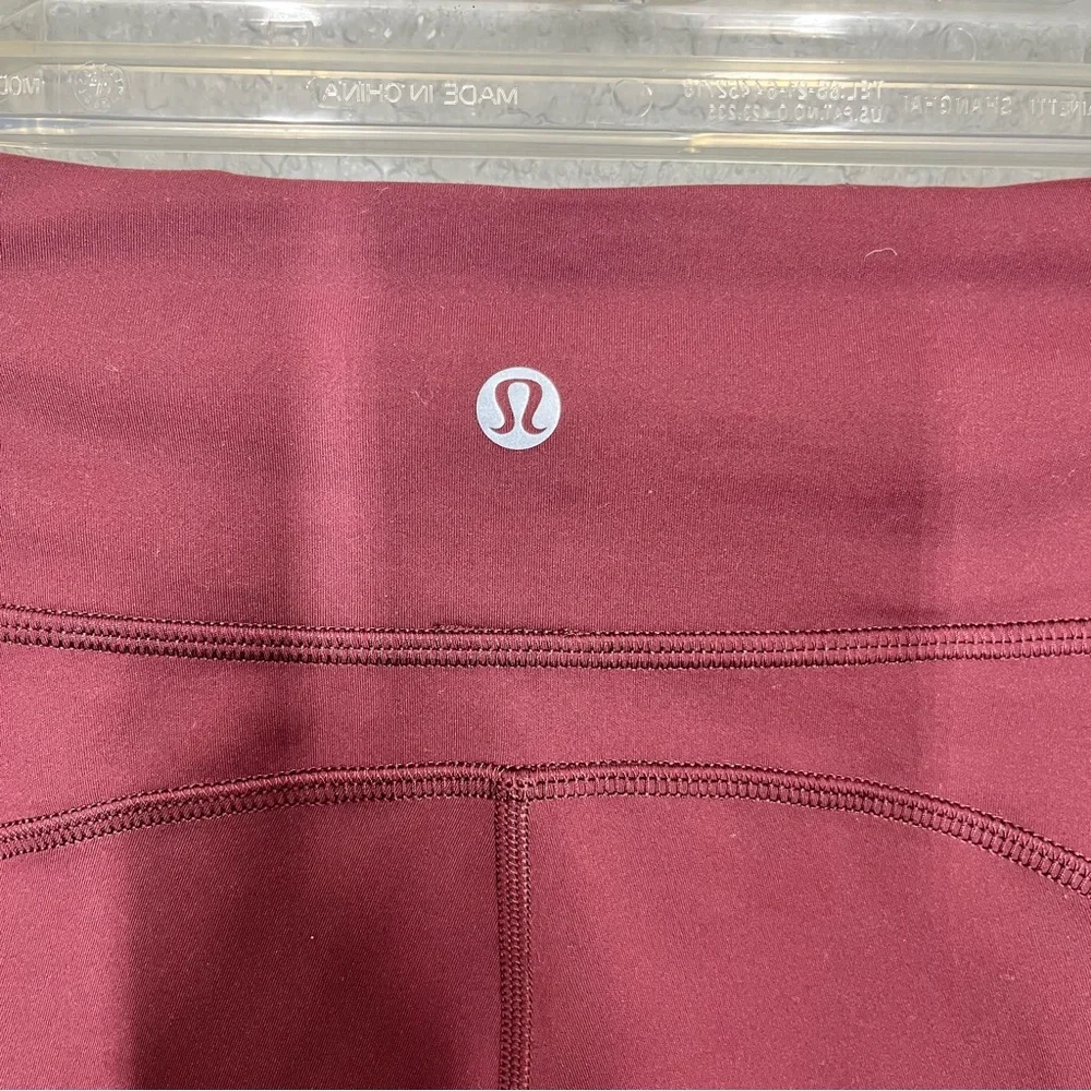 Lululemon Invigorate 25” maroon leggings - Picture 8 of 9